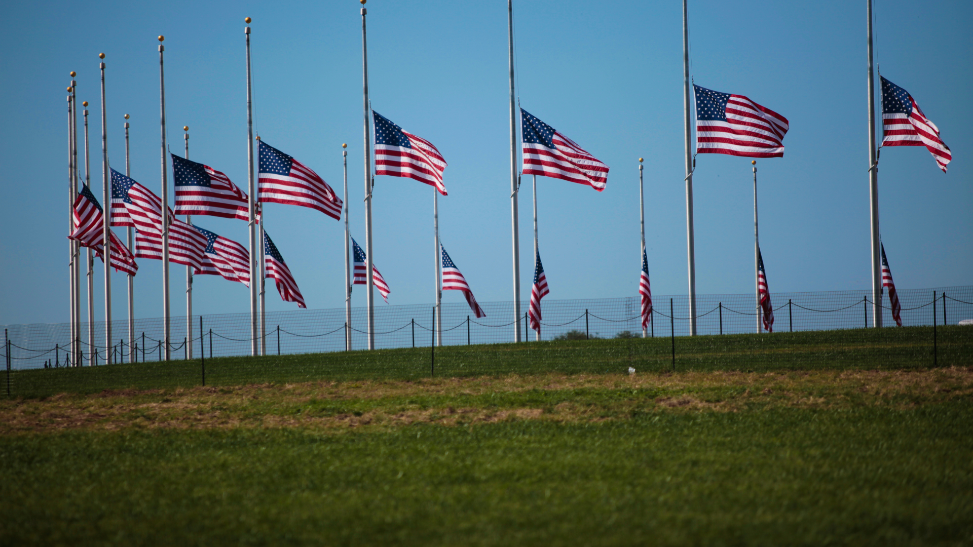 Why Dolly Parton’s Half-Staff Flag Order Lasts Longer Than Charlie Kirk’s